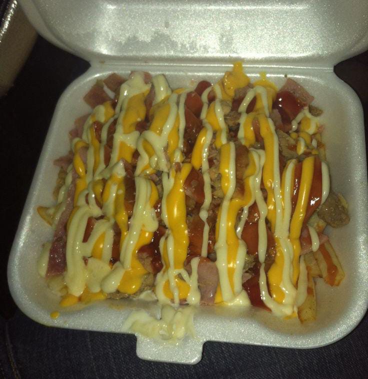 Salchipapas con Queso y Tocineta 2 o 3 Personas