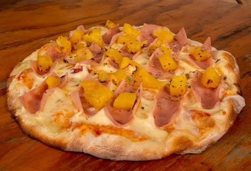 2 Porciones de Pizzas Hawaiana + 2 Gaseosas