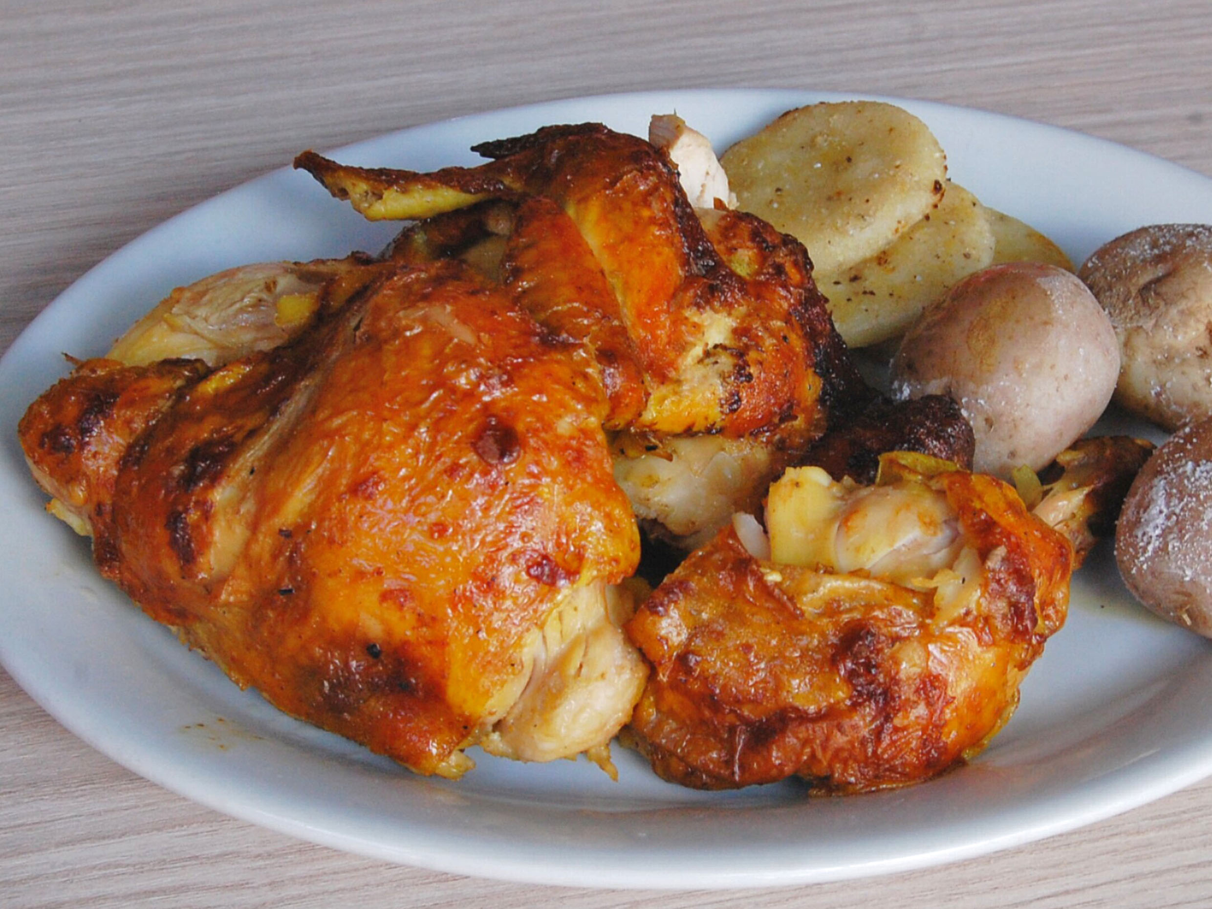 Medio pollo asado