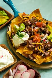NACHOS CON CHULETA