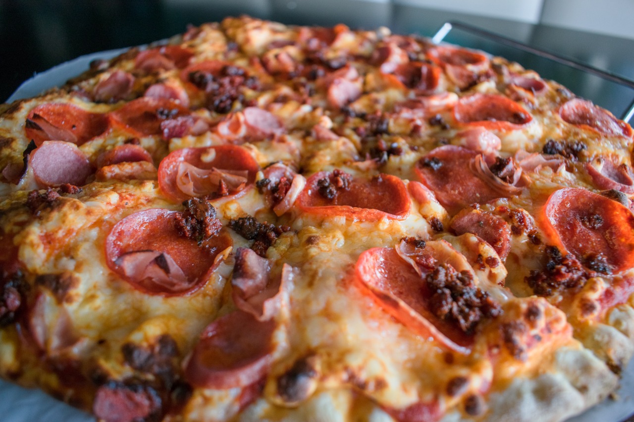 Pizza mediana + Refresco de 2LTs
