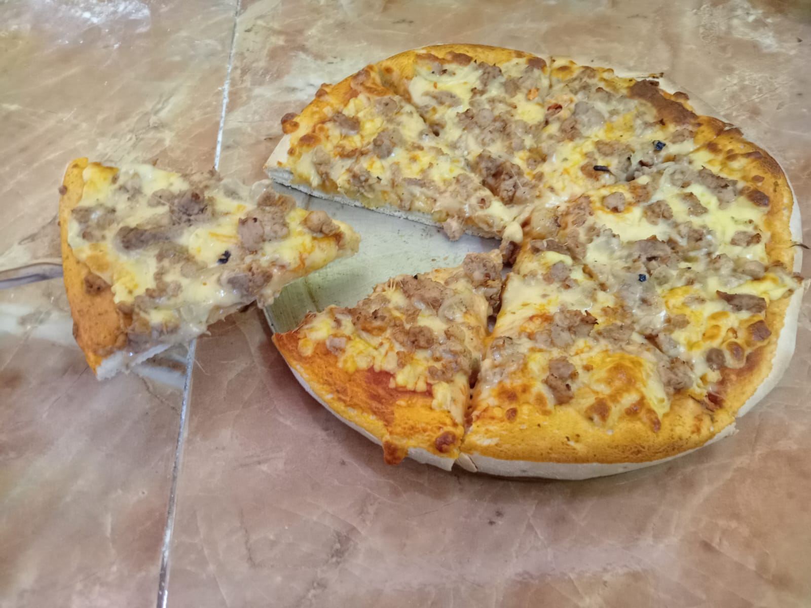 1 Pizza Mediana Especialidad.