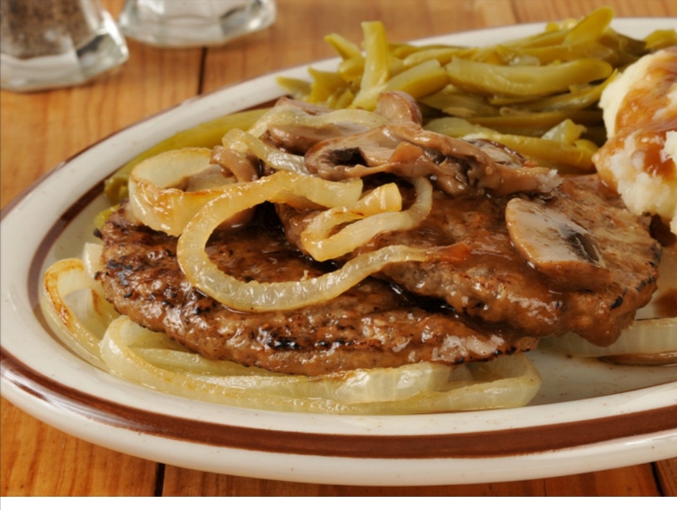 bistec encebollado