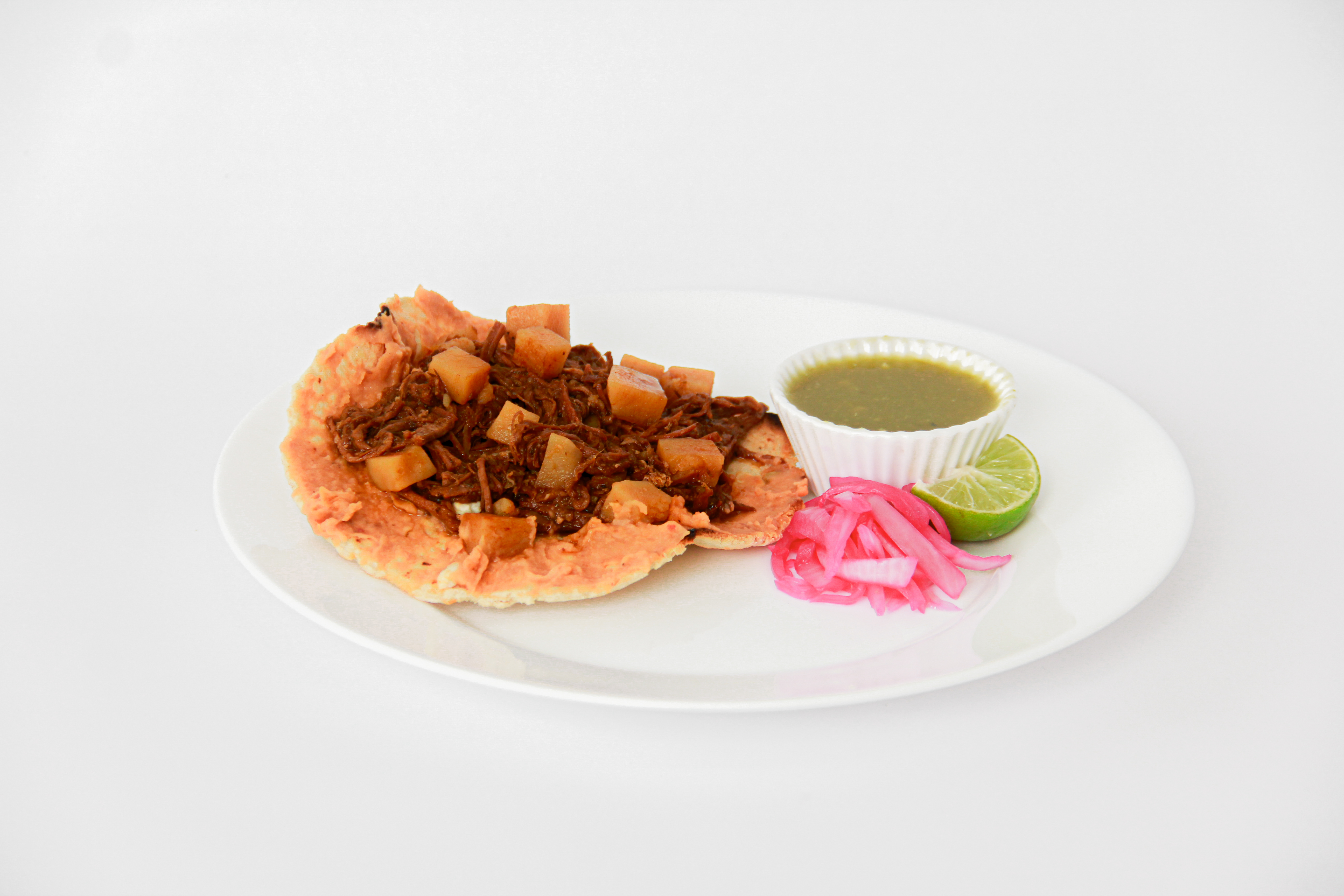 Tostada con Guisado