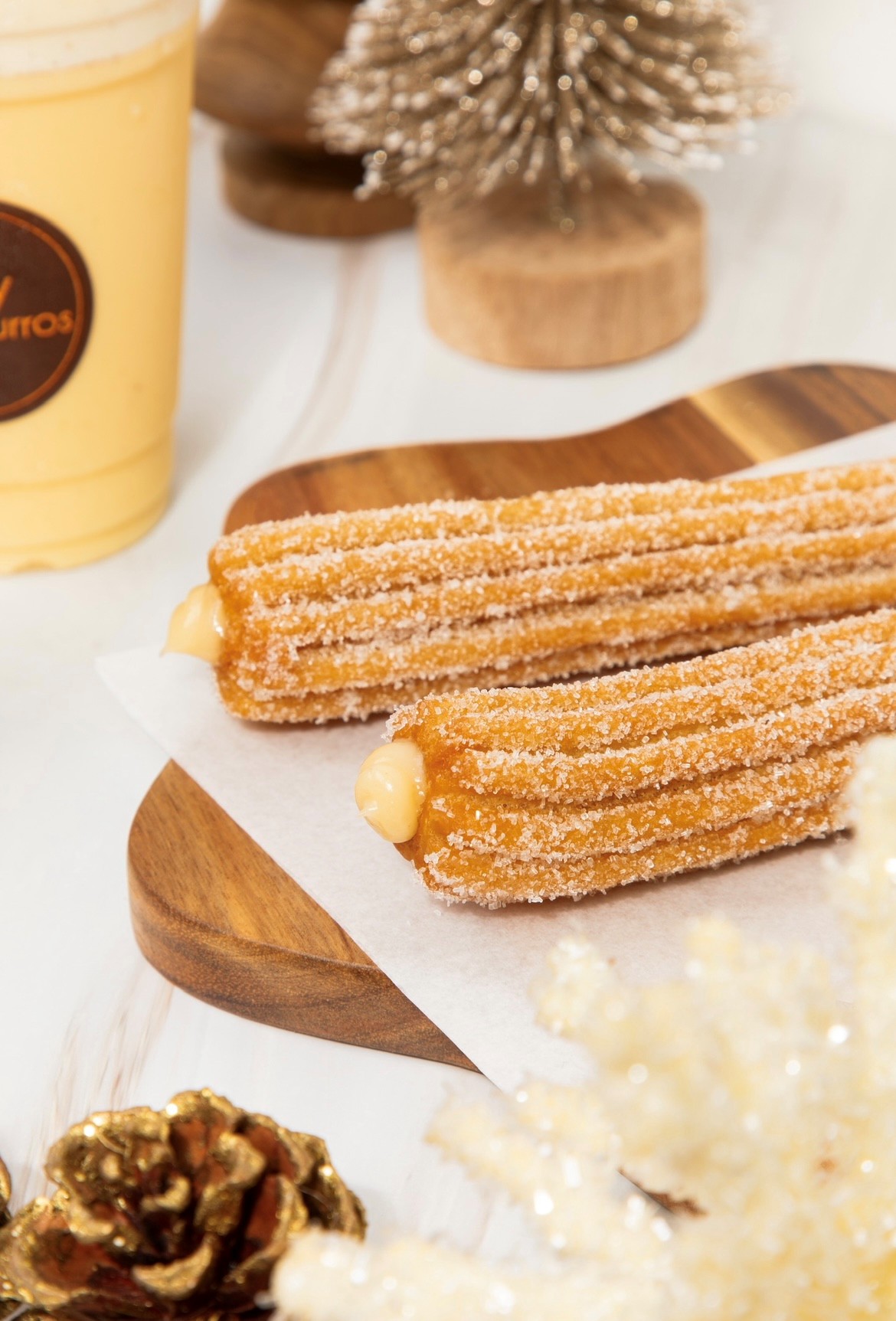 Churro relleno de rompope