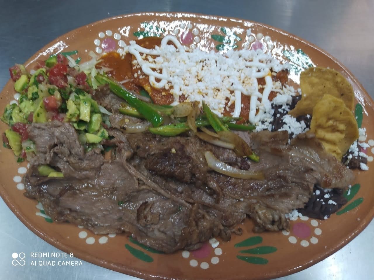 BISTEC ENCEBOLLADO