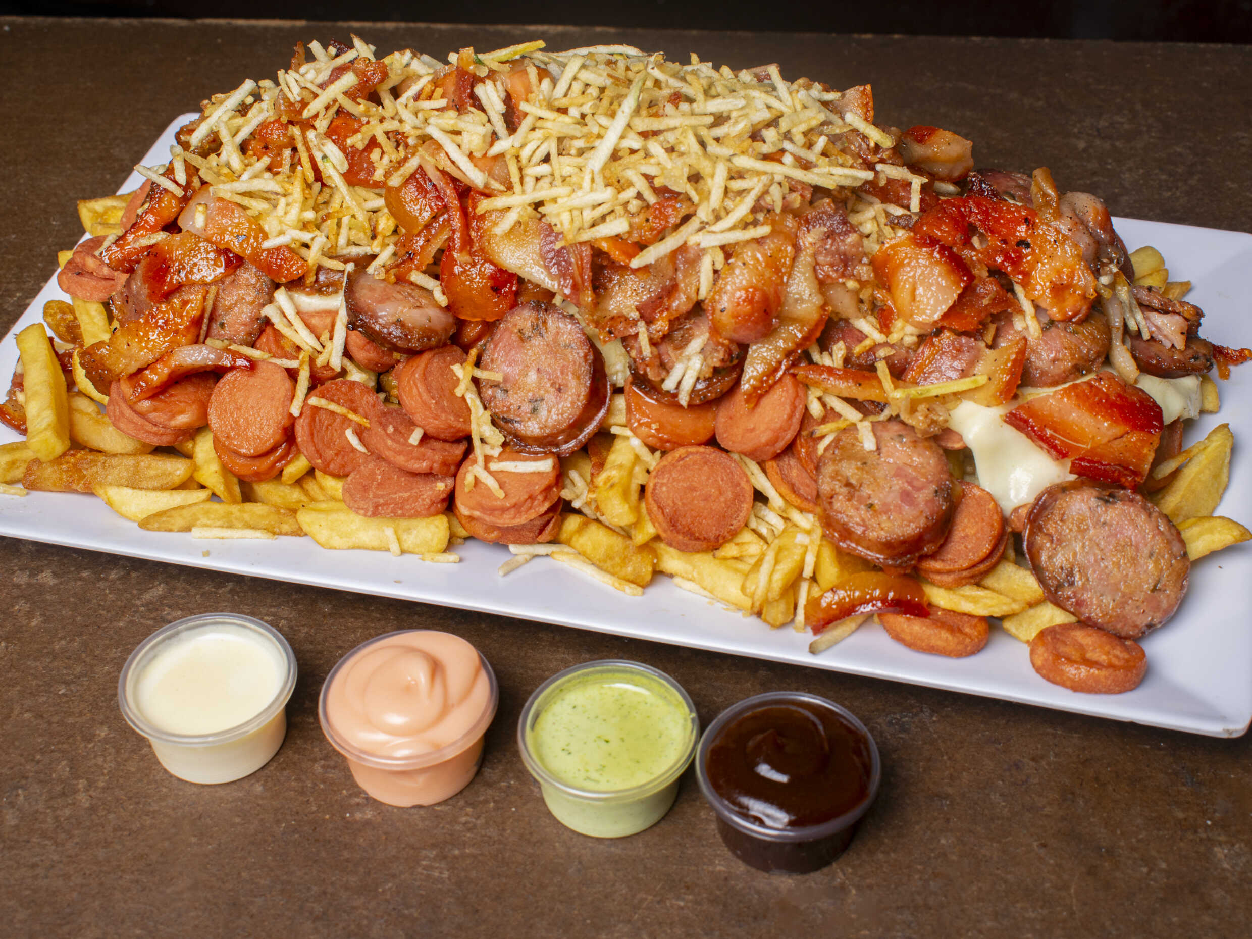 Salchipapa Grande Chorizo y Tocineta
