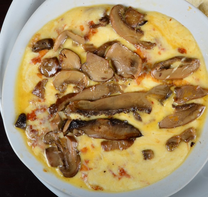 Queso Fundido con Champiñones