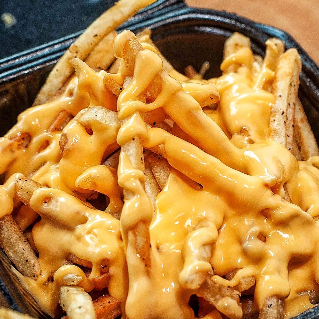 Papas Bañadas en Queso Cheddar 250g