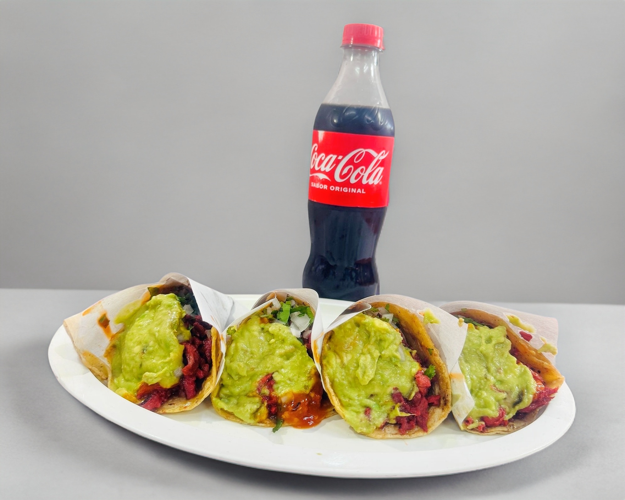 4 Tacos de Adobada mas Coca