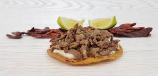 Tostada de Tres Carnes