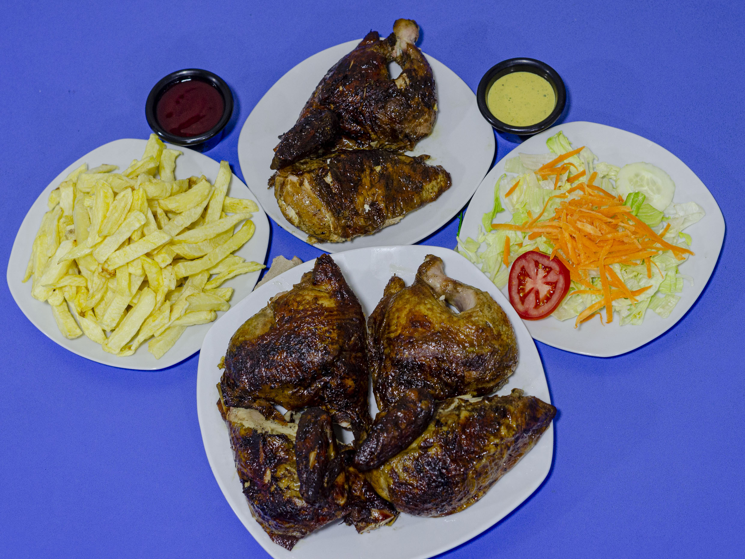 1 Pollo a la Leña más 1/2 de Pollo Pierna Solo