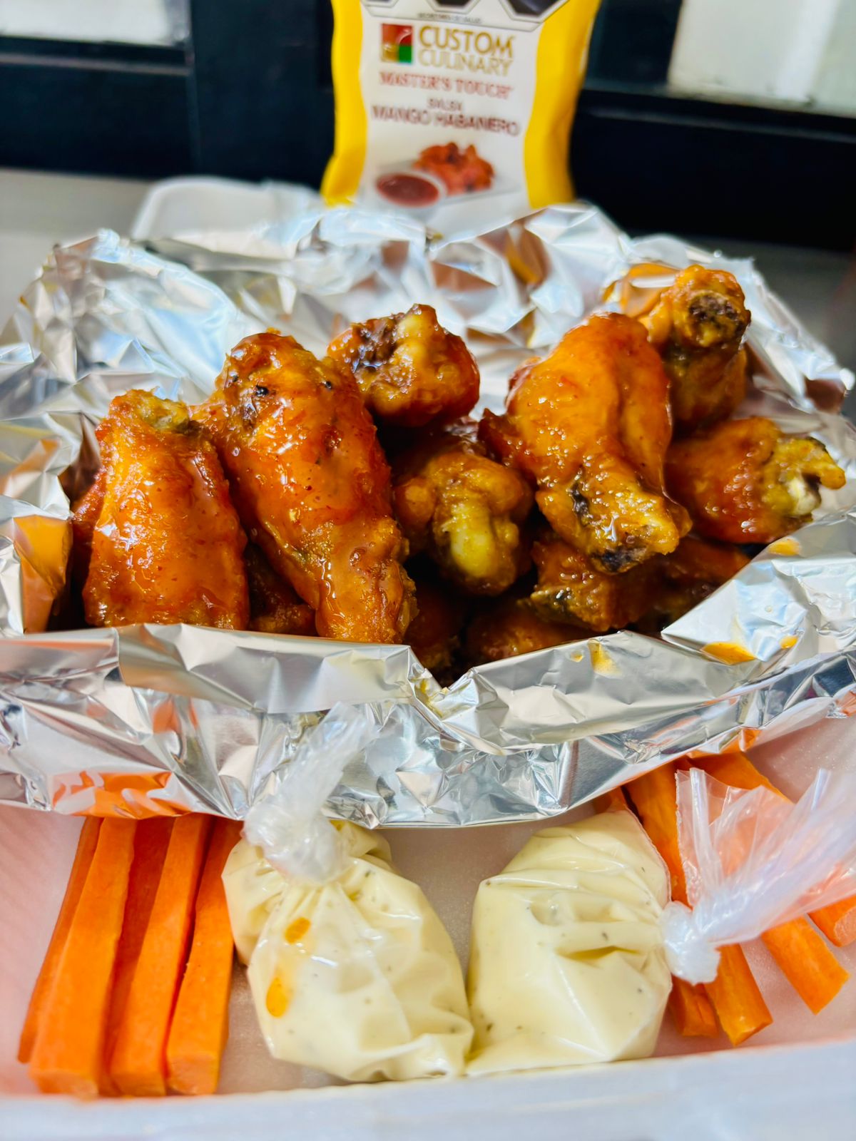 8 Alitas más Papas