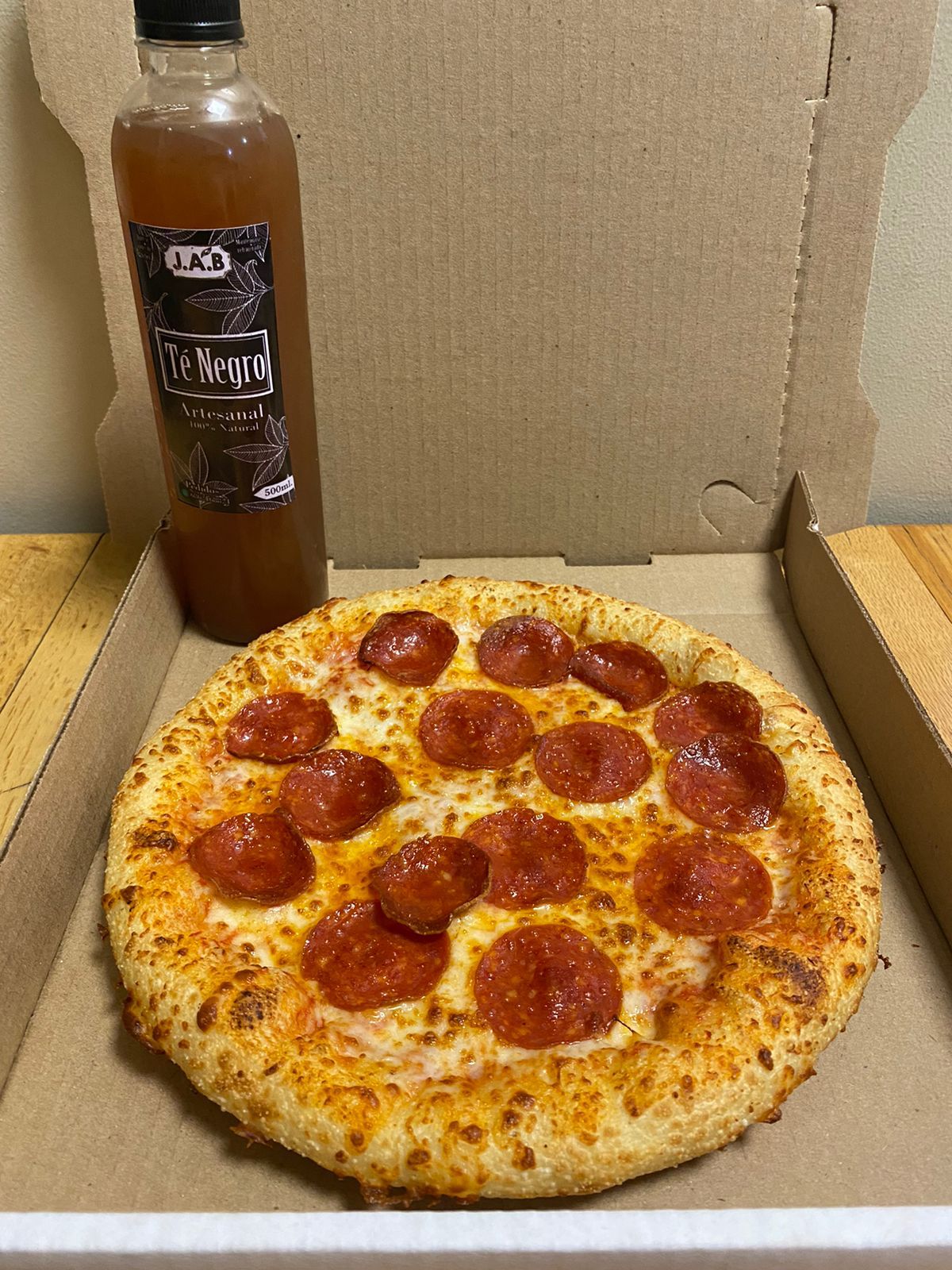 Pizza 10" + Té Negro 500 Ml