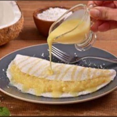 A simplicidade do coco com leite condensado, oferecendo uma doçura suave e deliciosa.