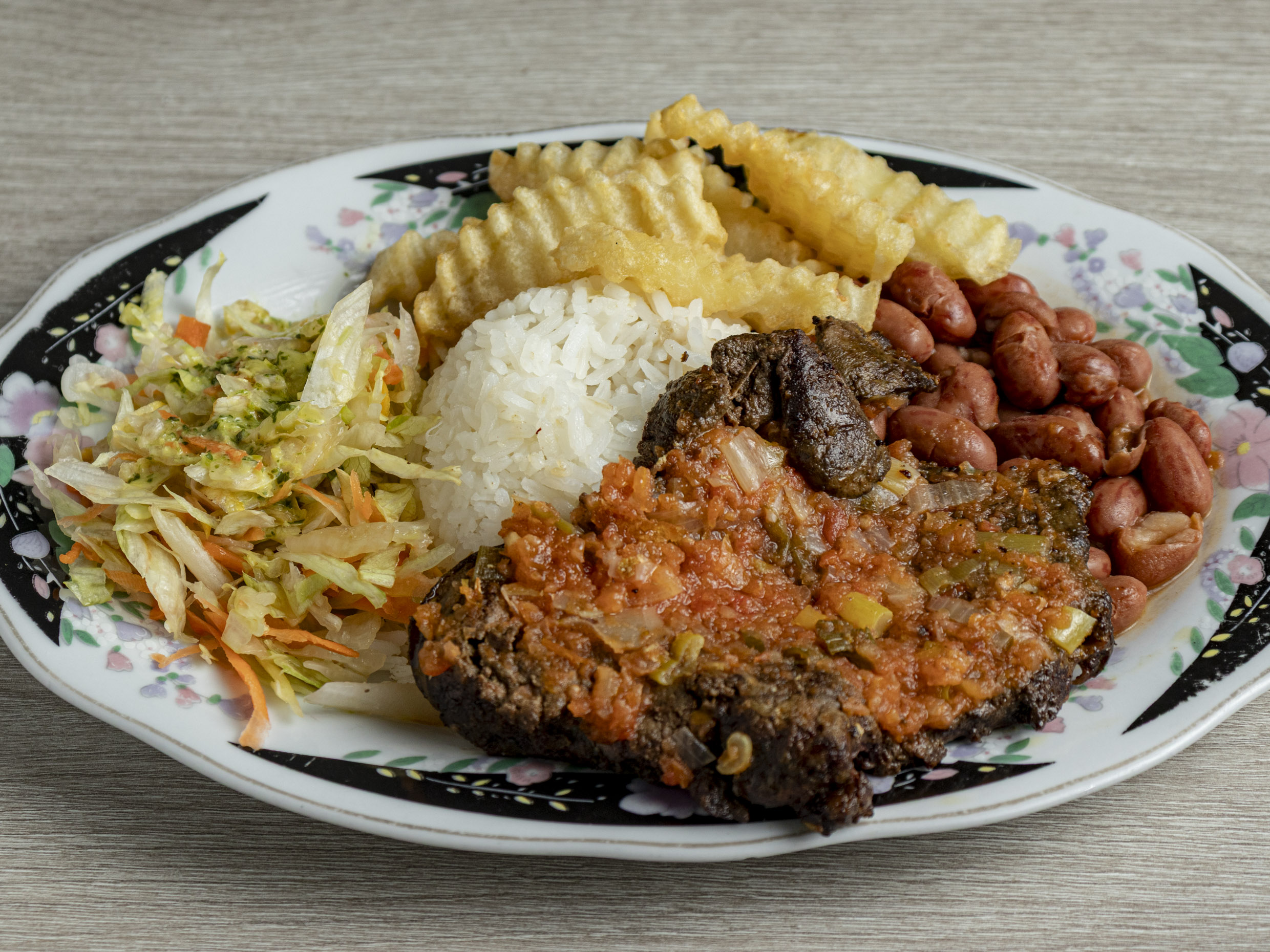 Almuerzo de Hígado Encebollado