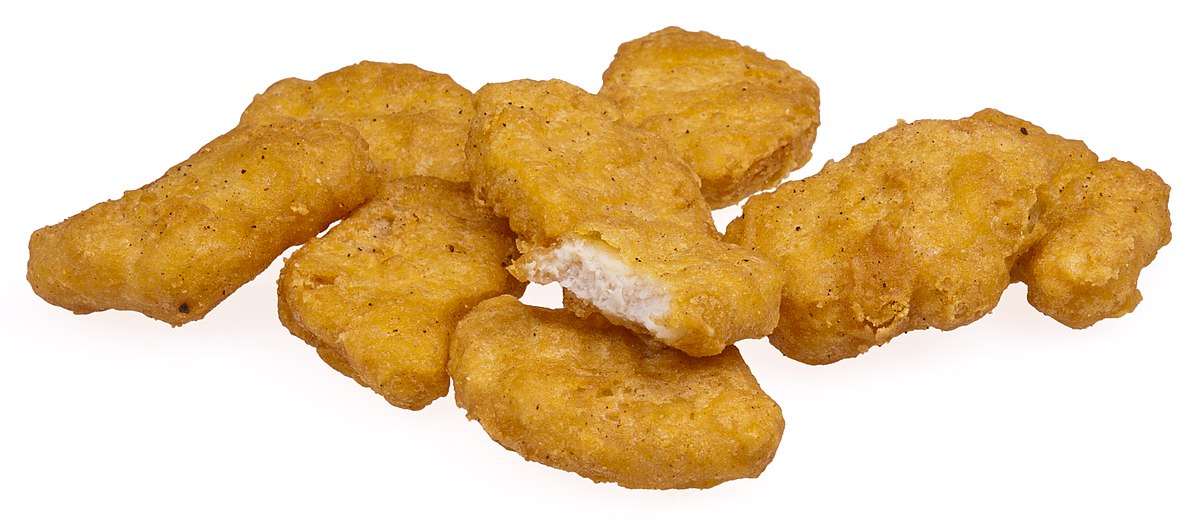 Porción de Nuggetts, 7u y Papas Fritas Naturales