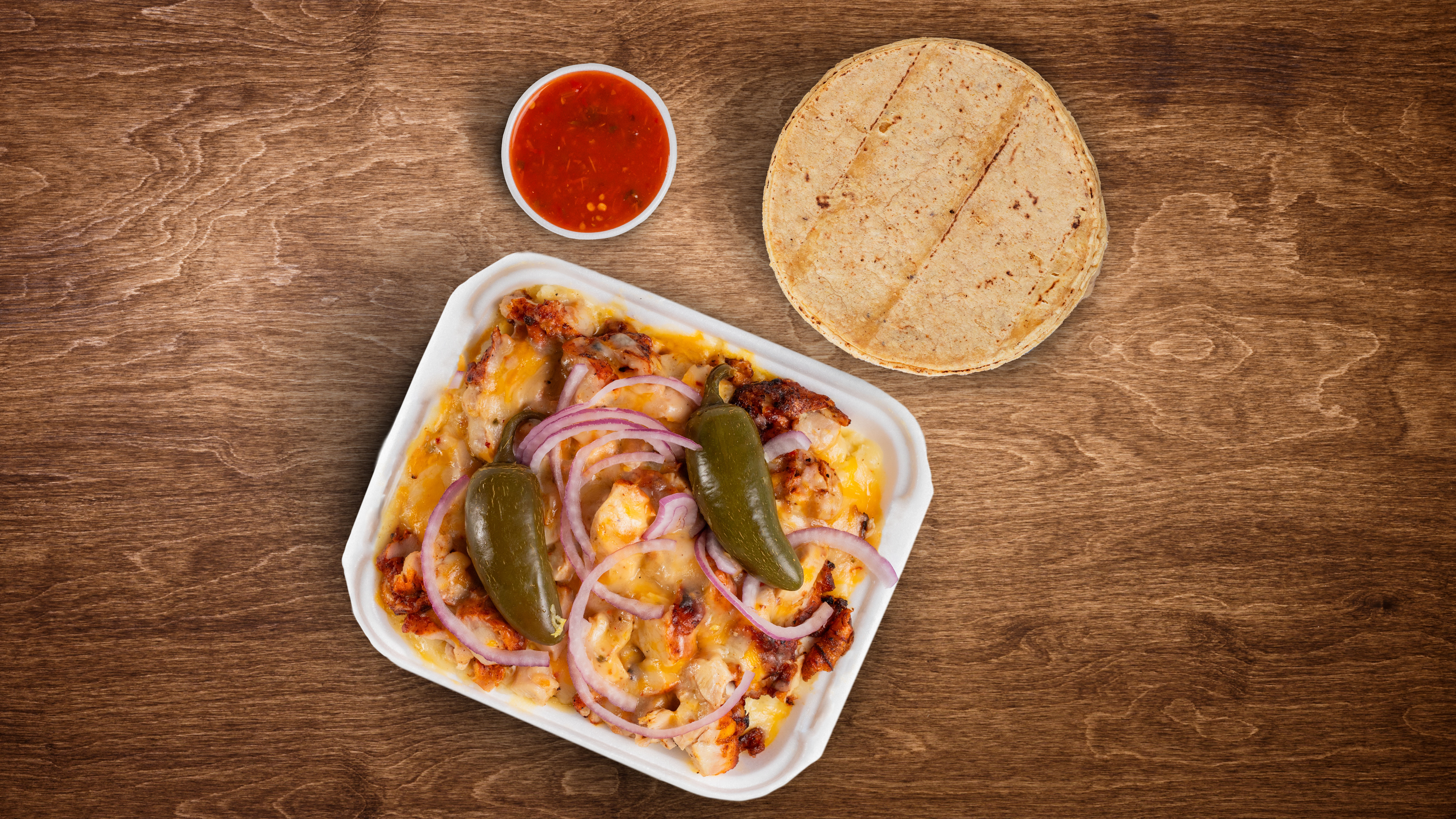 Papa Gratinada + Mix Asada y Pollo (1-2 personas)
