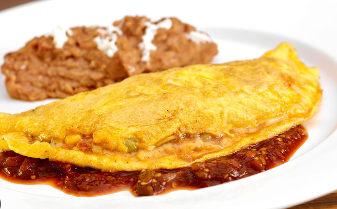 Omelette con queso y espinacas