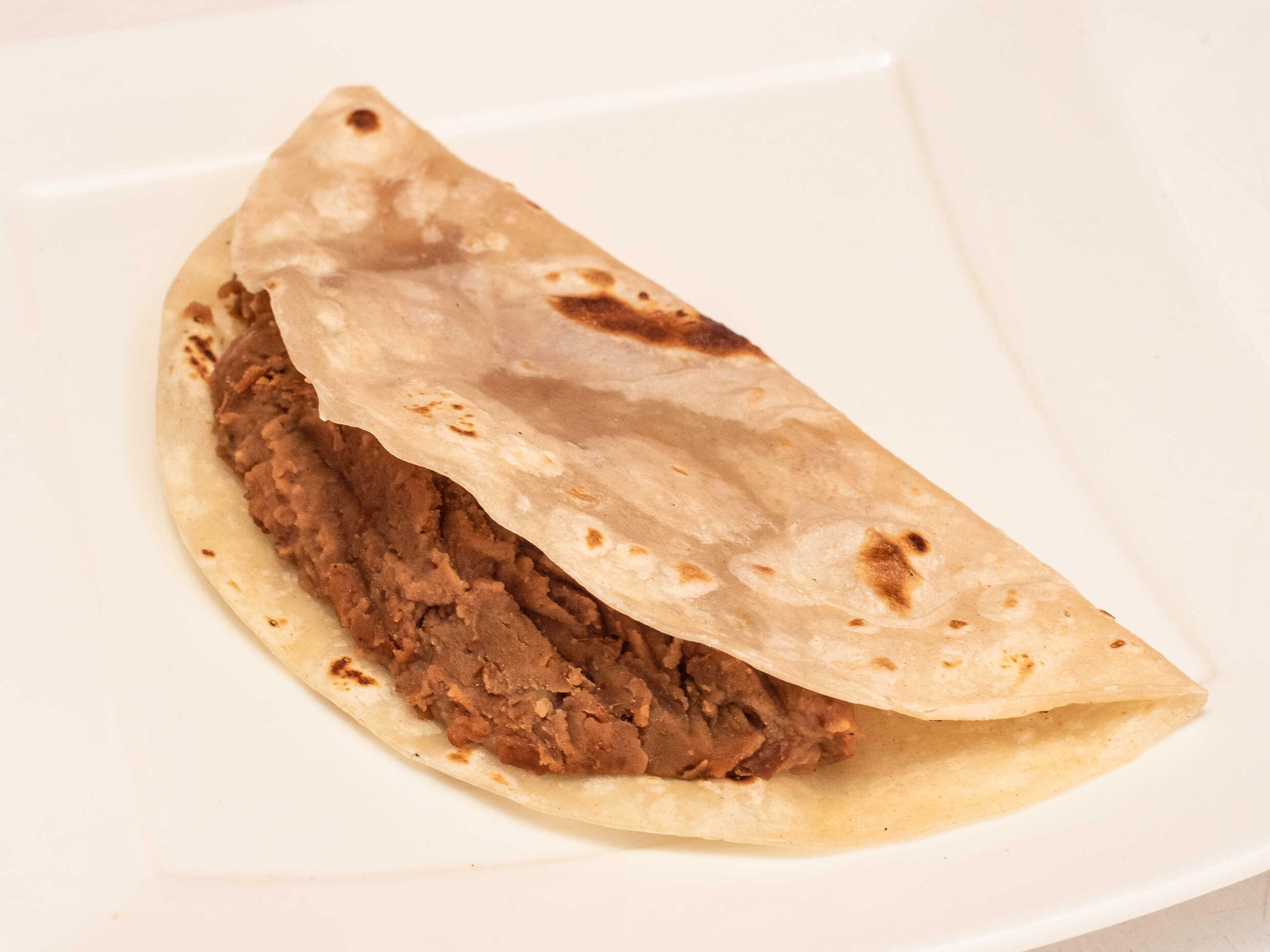 Taco de Frijolitos con Chorizo