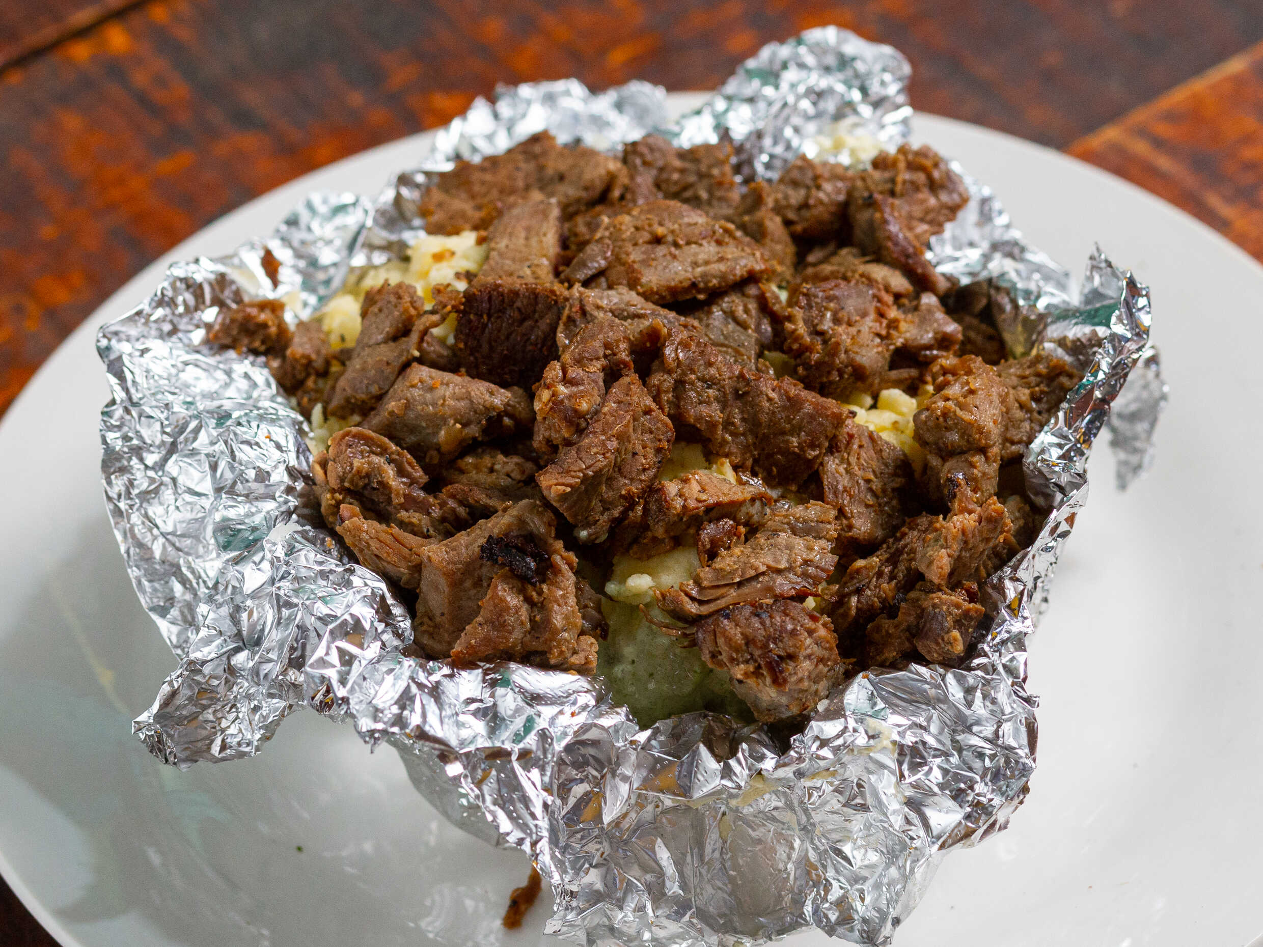 Papa al Carbón con Arrachera.