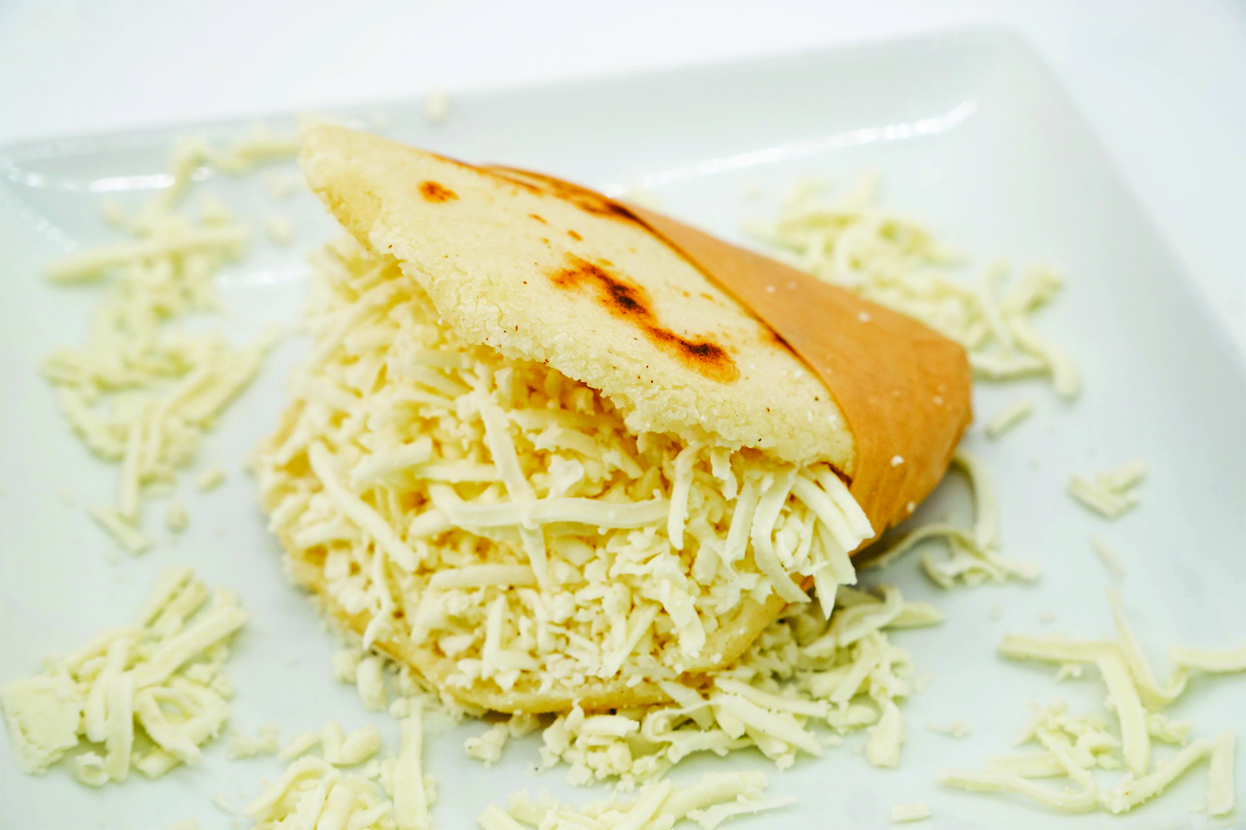 Arepa de Queso más Gaseosa