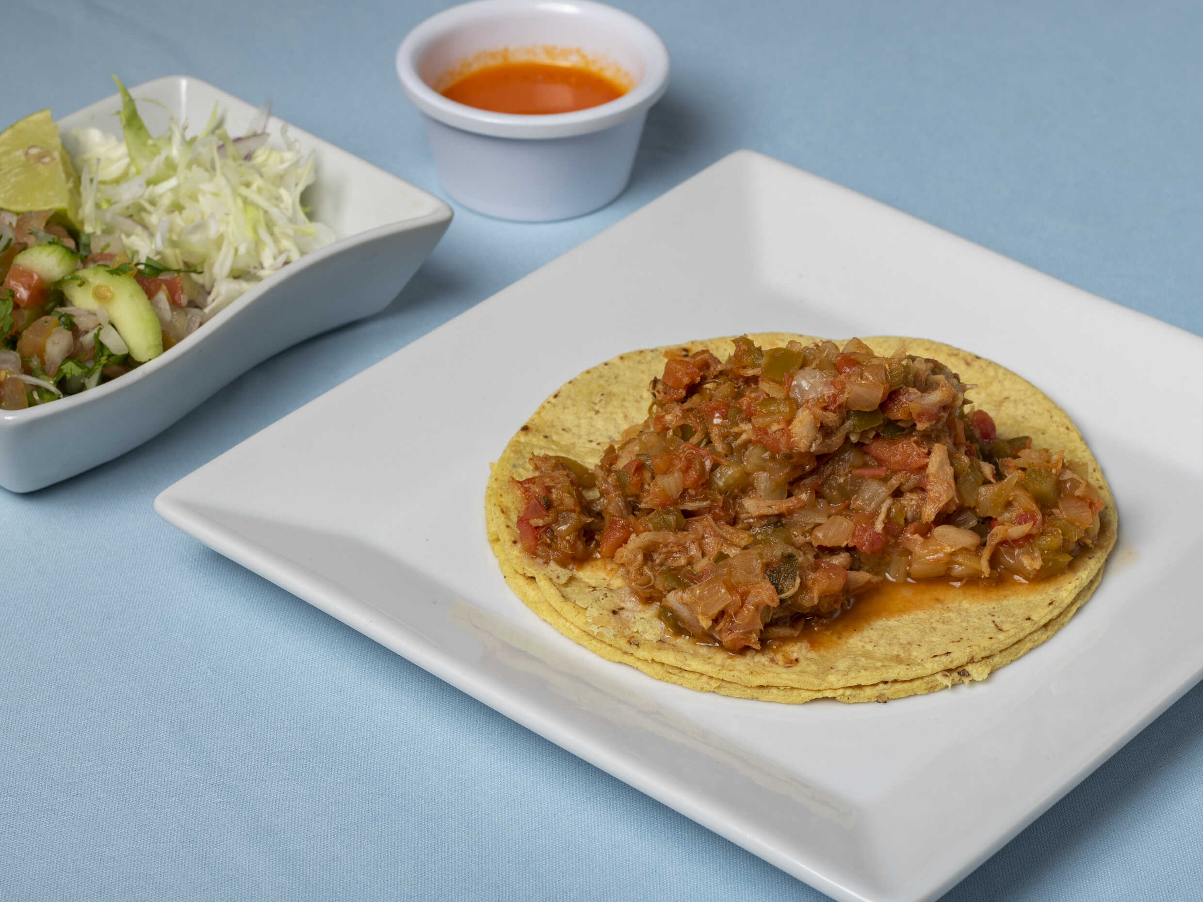 3 Tacos de Mantarraya + Agua de Limón.