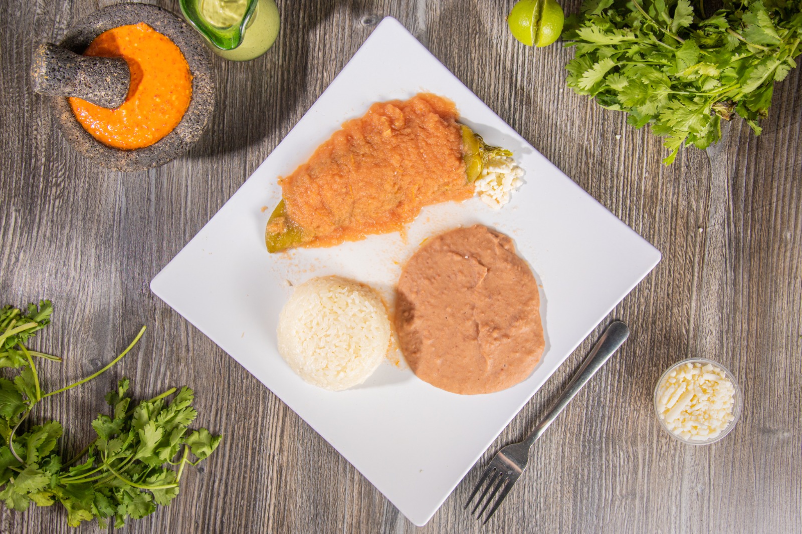 2 Chiles Rellenos con Arroz *