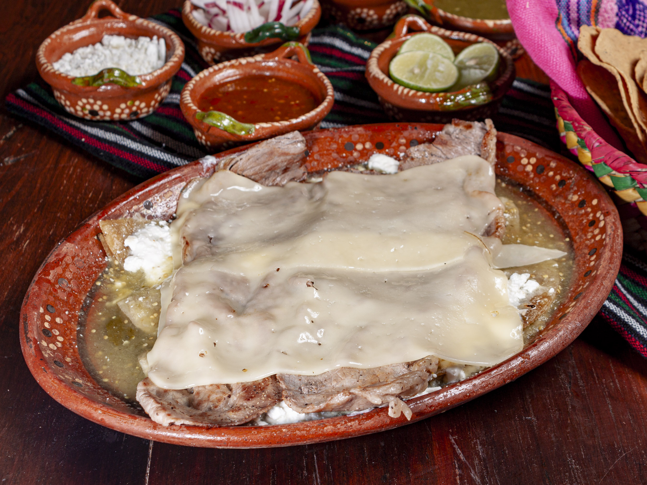 Enchiladas con carne asada gratinadas