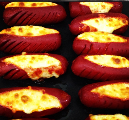 1 pza de Salchicha con Queso