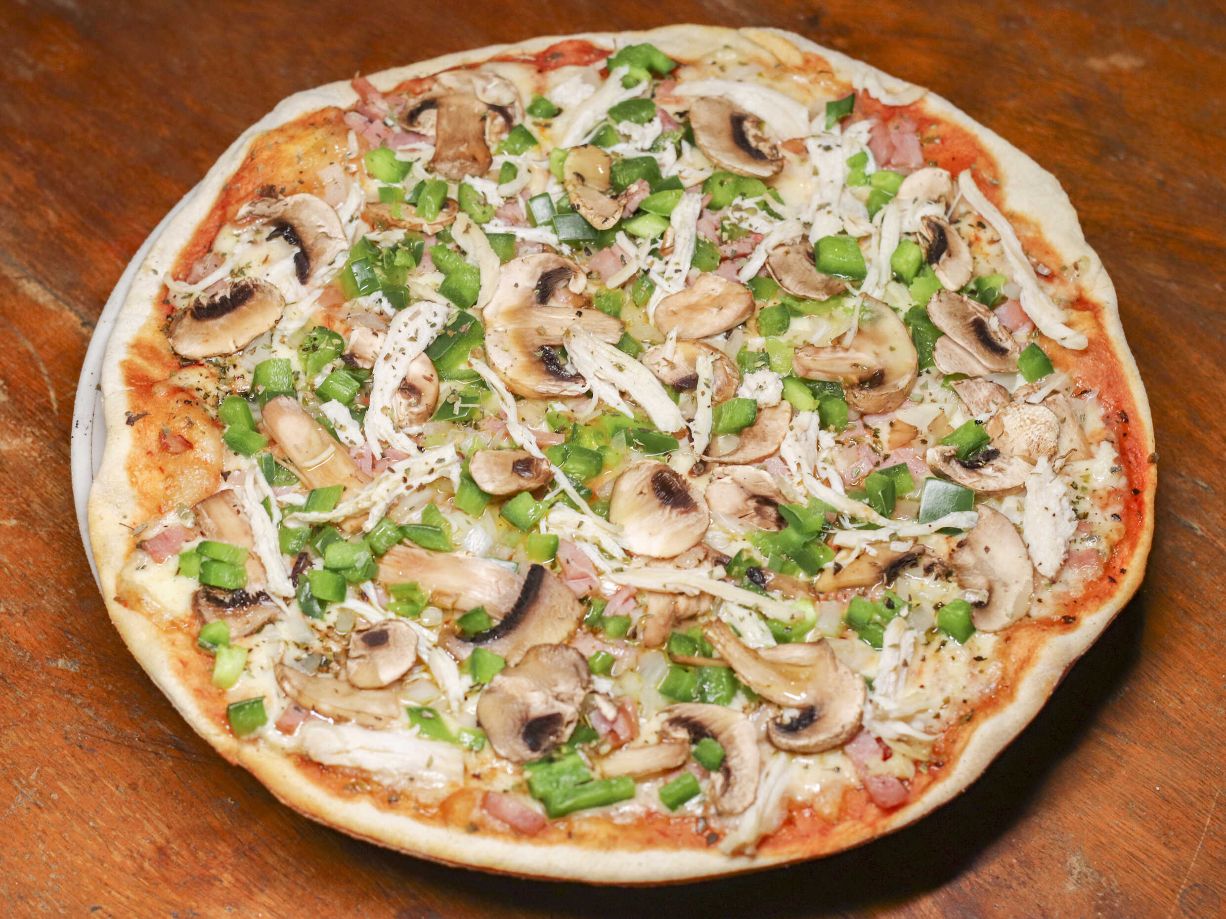 Pizza Especial Personal Verduras, Tocineta y Pollo