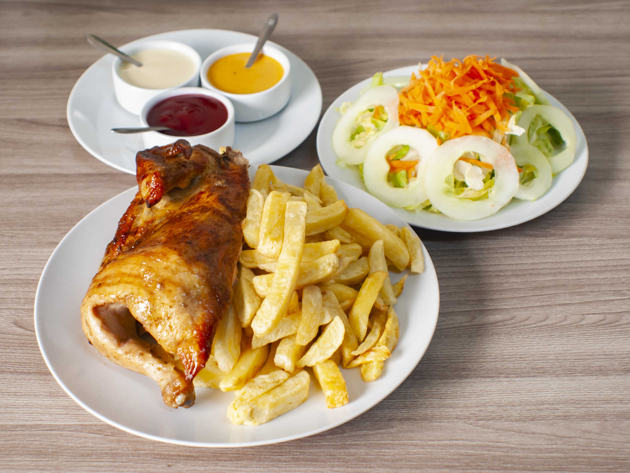 1/2 Pollo a la Brasa + Gaseosa 1L
