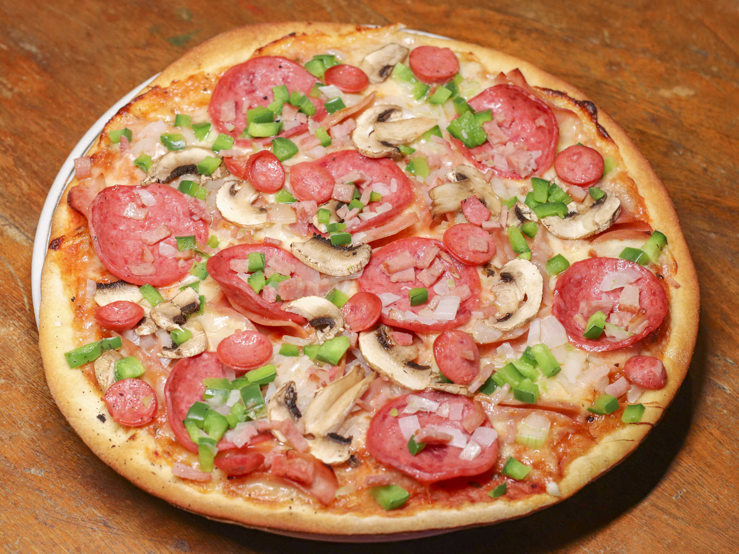 Pizza Combinada Personal Huerta