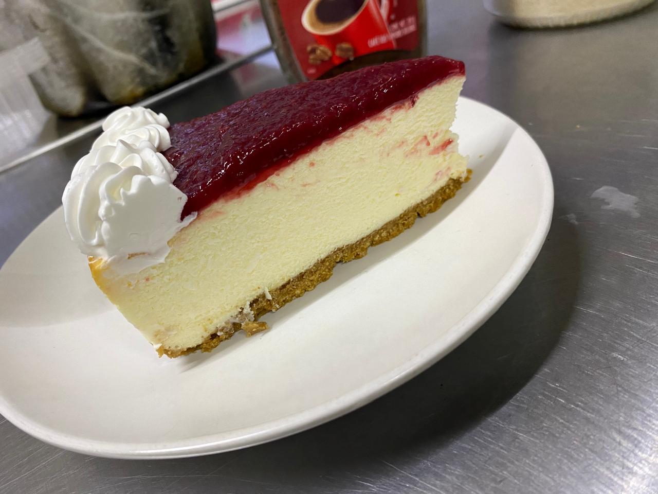 Rebanada Pay de Queso con Frambuesa