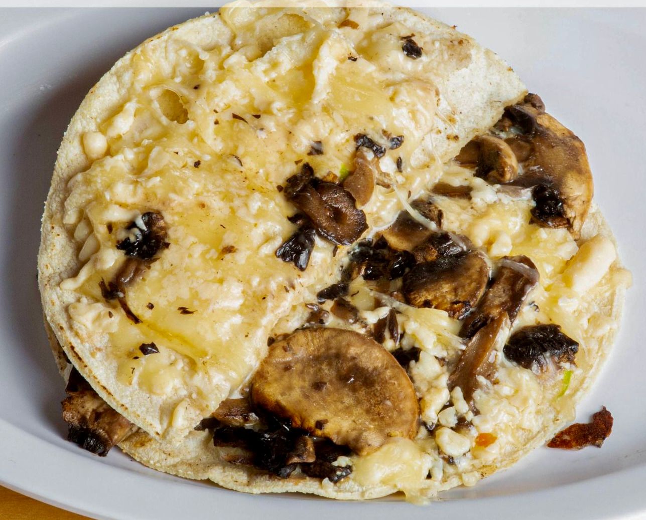 Queca con Champiñones