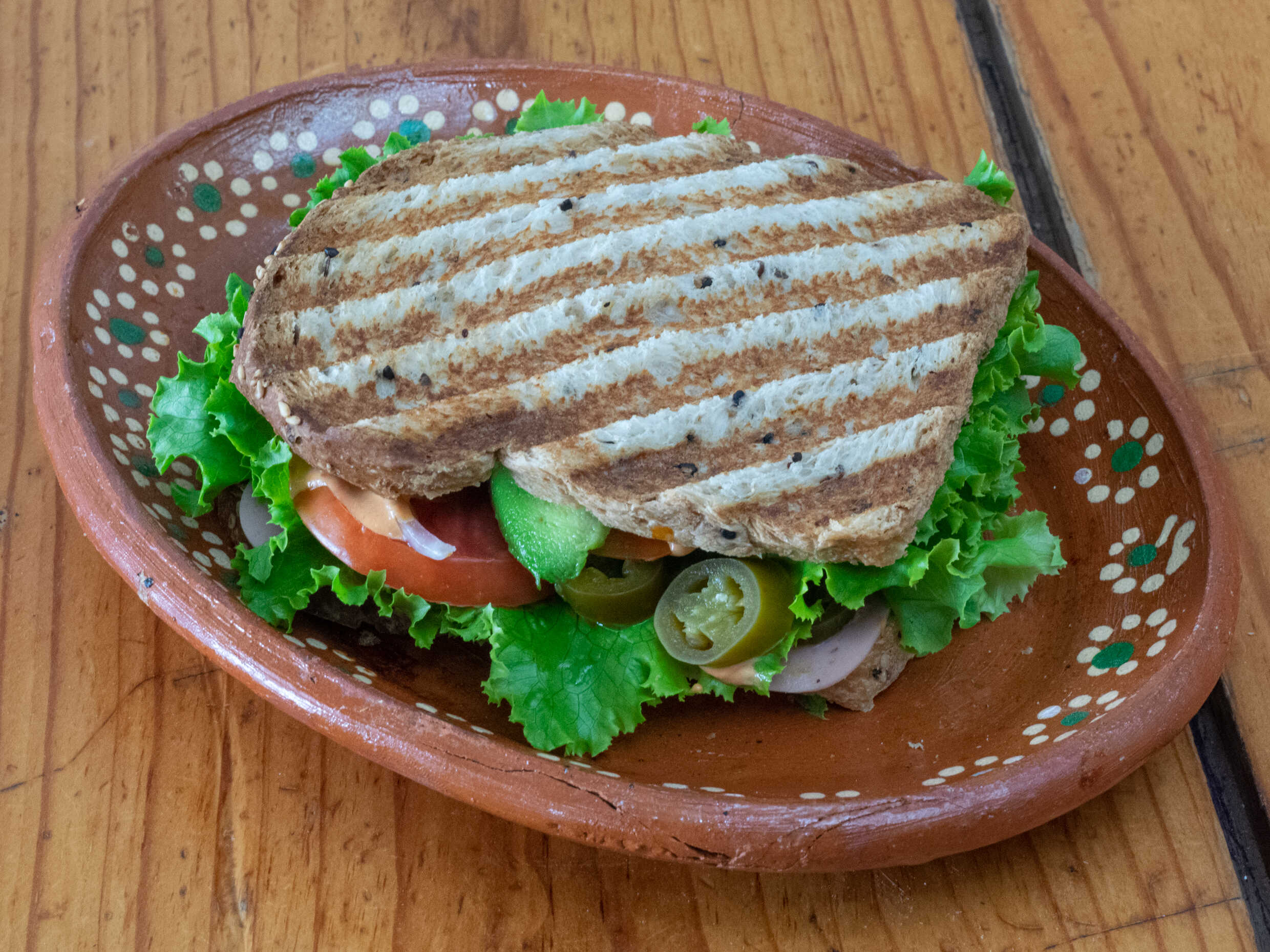 Sándwich de pollo más licuado de plátano de 1/2