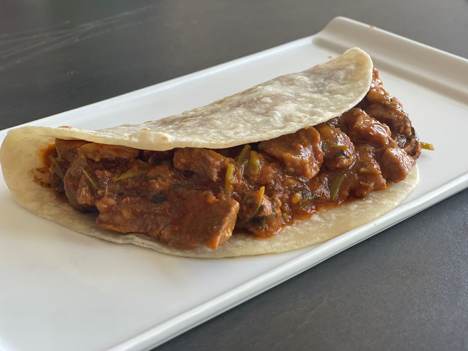 Bistec en salsa roja