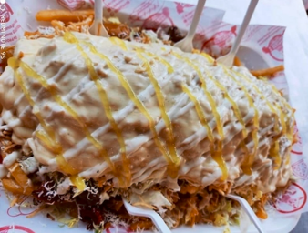 Salchipapa SUIZA Gratinada