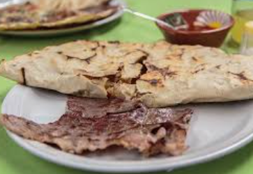 Combo Tlayuda de Tasajo + Agua del dia