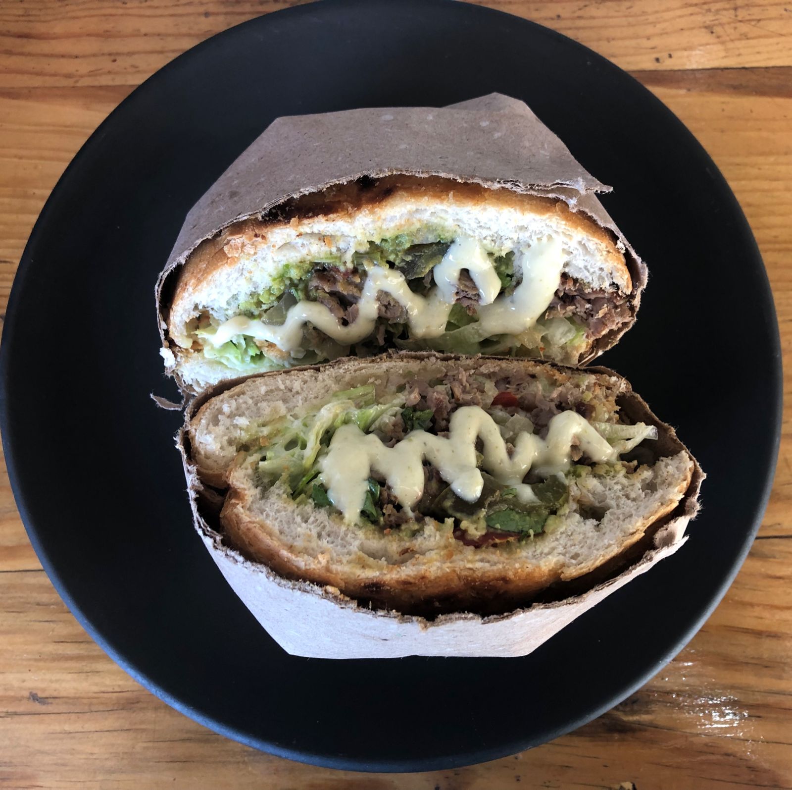 Torta de milanesa con queso oaxaca