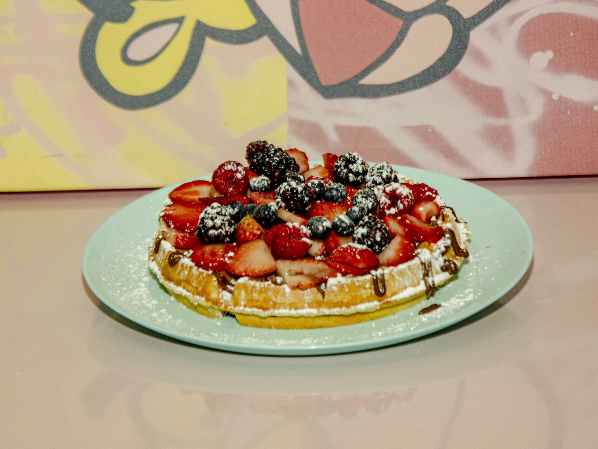 Waffle frutos rojos con mapple