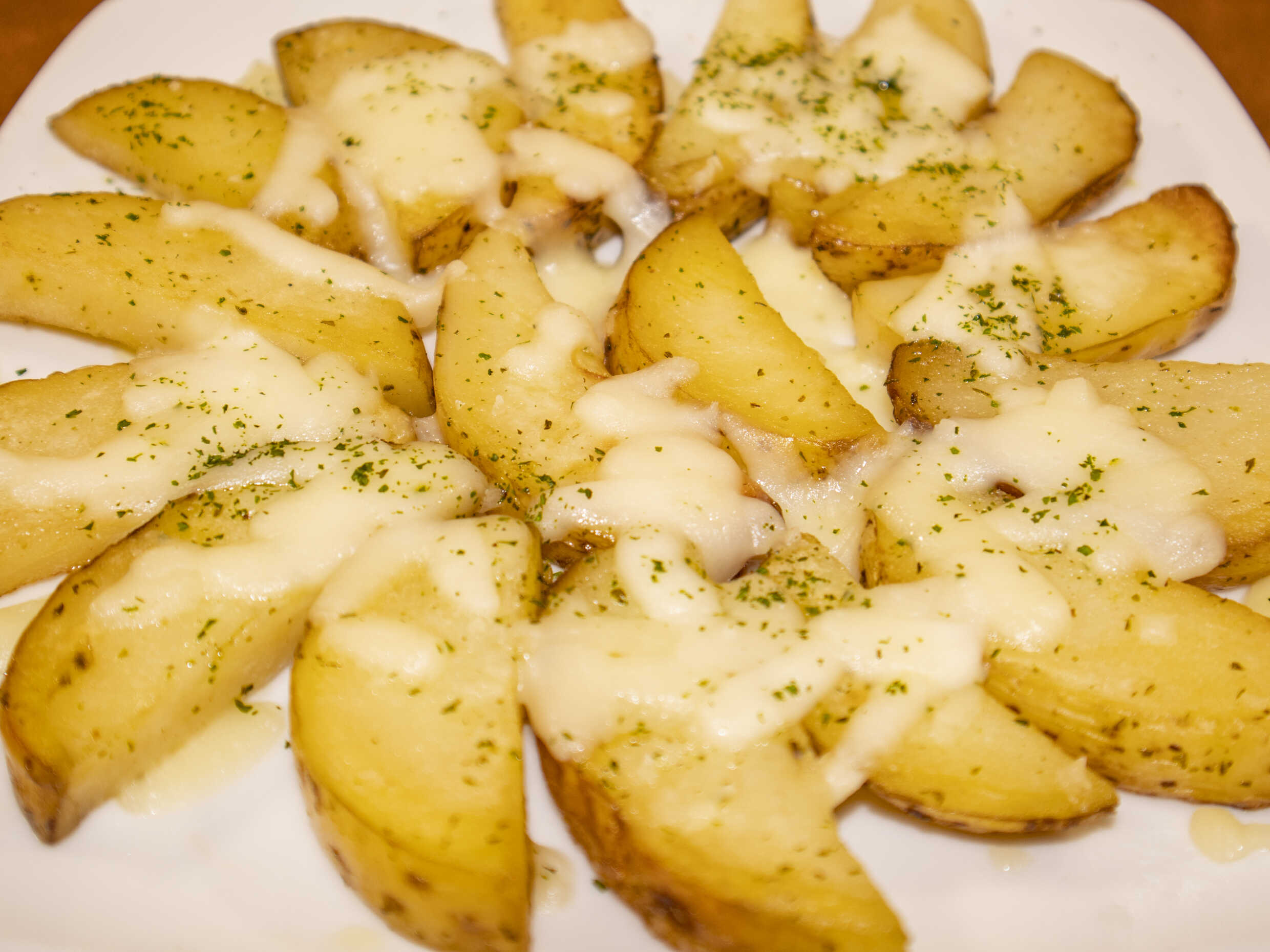 Orden de papas en gajo