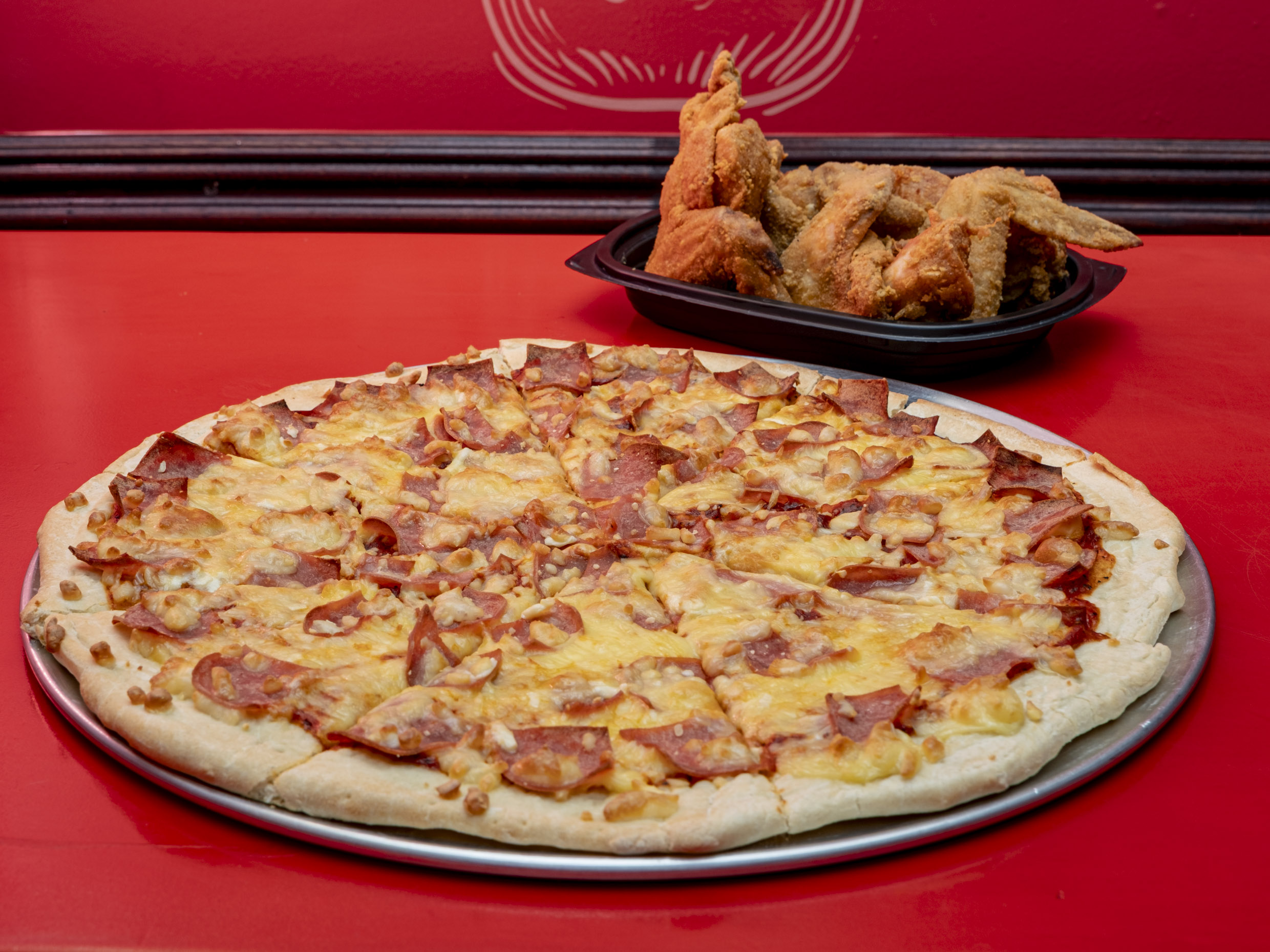 Pizza Grande + 6 alitas