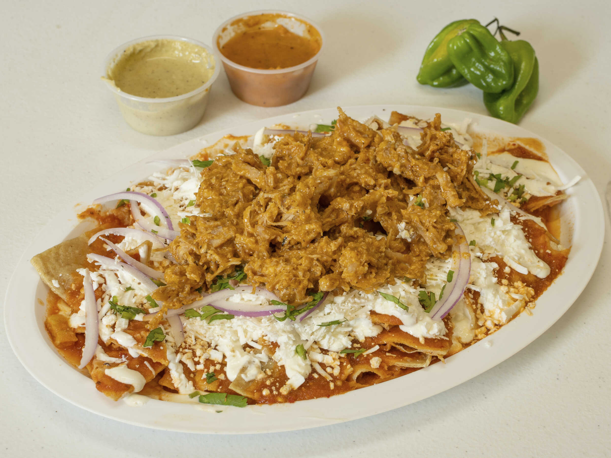 Chilaquiles a la Brava con Cochinita Pibil