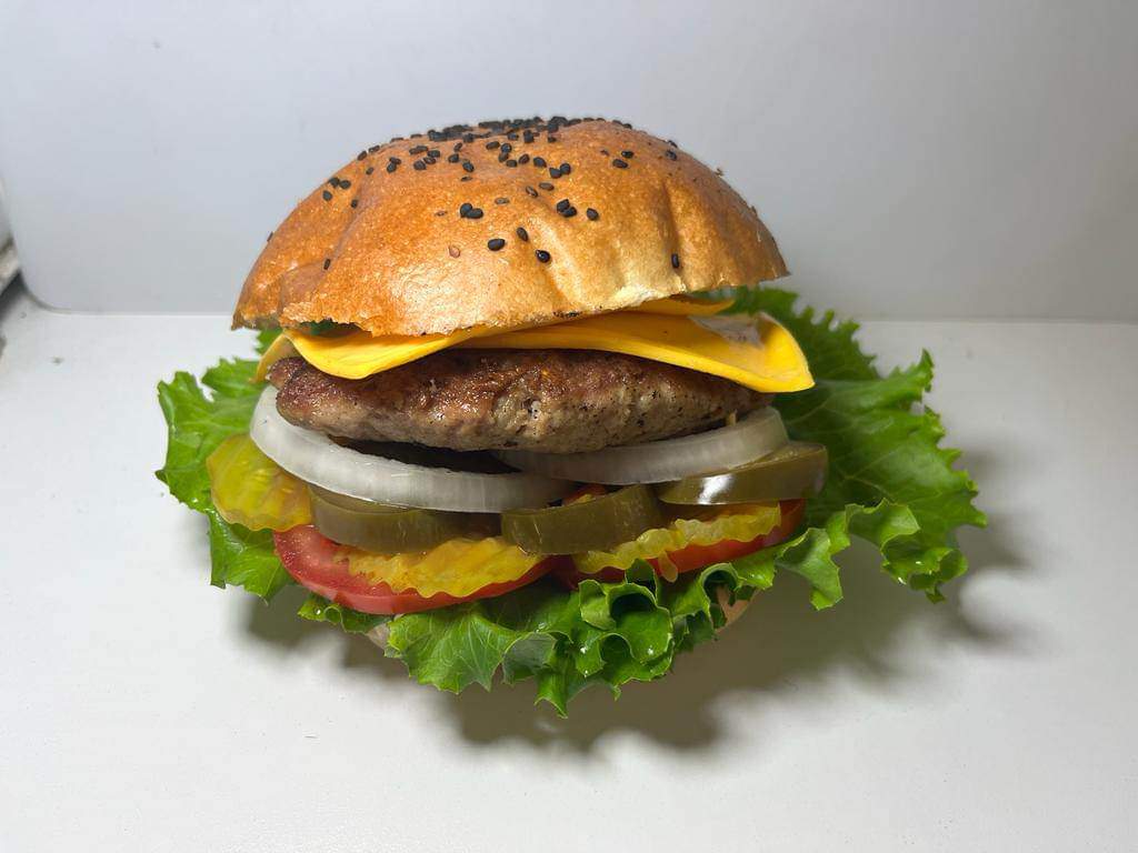4 Hamburguesas Clásicas y 1  Ordenes de Papas