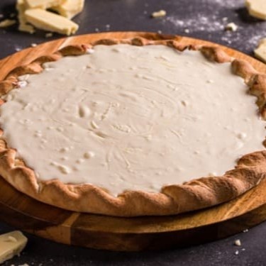 Aos os amantes de Chocolate branco essa maravilhosa pizza que leva: Creme de leite e Bastante chocolate branco. Brotão (25cm)