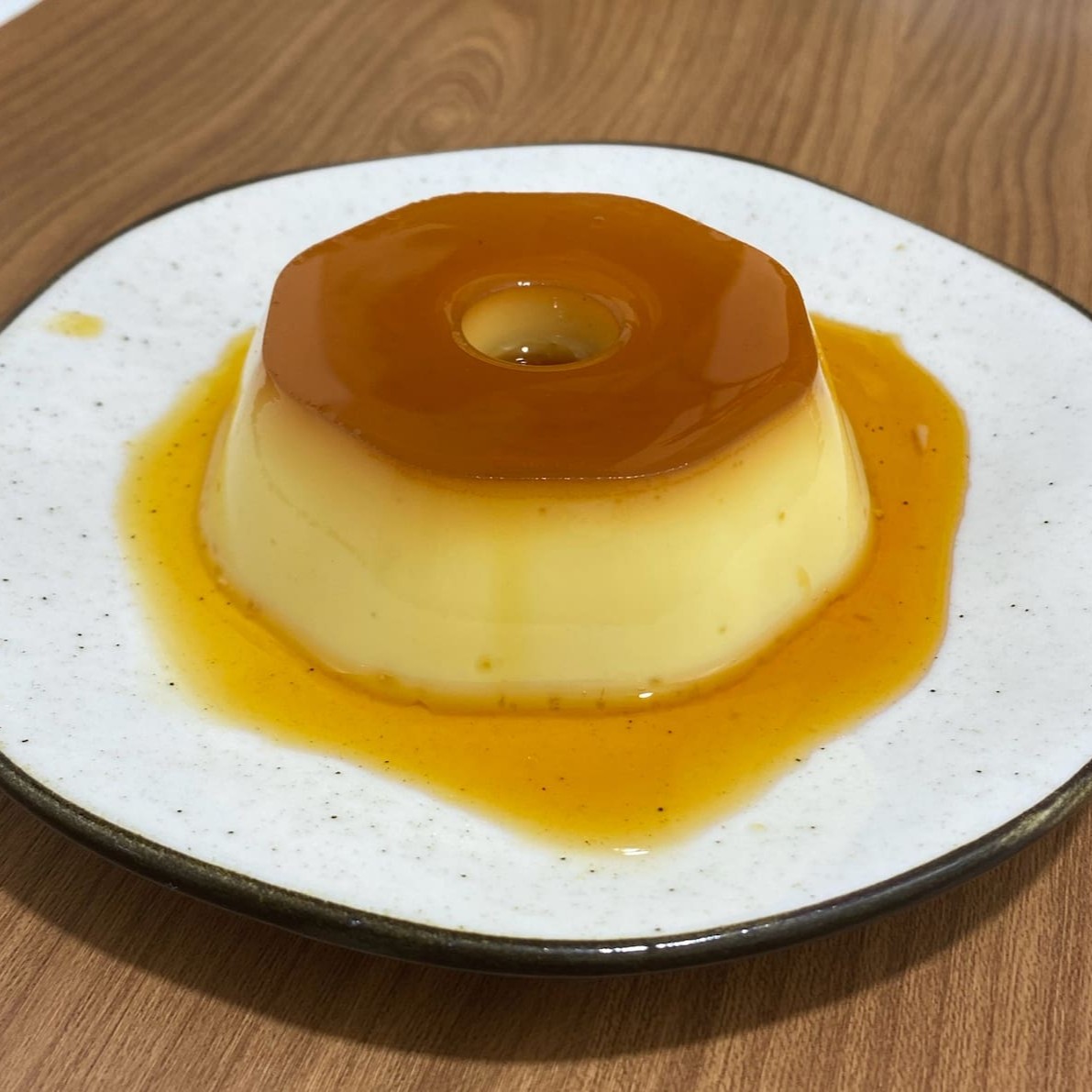 O pudim perfeito existe, lisinho, com um toque de fava de baunilha e com uma calda de caramelo delícia. Tamanho da embalagem: 120ml   promoção , cupom , oferta , morango , sobremesa , red velvet , banoffe , pudim , doce de leite , Dia dos namorados , festa junina , bolo gelado , Ninho , trufado , cone , café , frete grátis , presente , coxinha , gostoso , preço baixo , combo , promo , Doces , bolos , brigadeiro , docinhos , bolo vulcão , aniversario , coco , bolo de pote , gelado , chocolate , Pipoca gourmet , biscoito amanteigado, empada , frango , pistache , frutas vermelhas , geleia , coca , refri , combo , salgado , mousse , entrega rápida , grátis , 0800 , desconto , almoço barato , Nutella , brownie recheado , lanche barato , afogadinho , empada , cookies , cookie recheado , cookie americano , fatia recheada