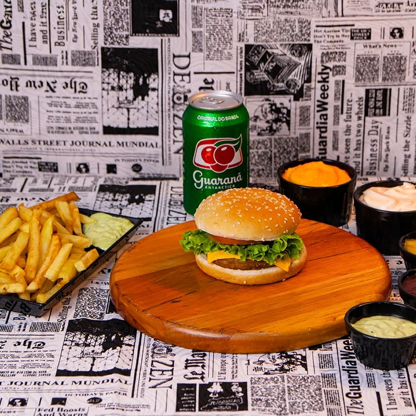 Hambúrguer + Batata pequena + refri lata 350ml  Pão, carne, cheddar e salada