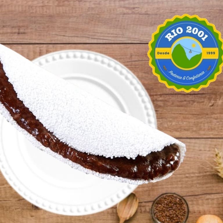 Saboreie a nossa exuberante Tapioca de Nutella, uma verdadeira joia da culinária brasileira. Esta delícia é cuidadosamente preparada com a massa finamente peneirada da mandioca, que resulta em uma tapioca macia e levemente crocante. O recheio é generosamente preenchido com a mundialmente famosa Nutella, um creme de avelãs com chocolate que é pura indulgência. A combinação é simplesmente irresistível, proporcionando uma experiência gastronômica única, perfeita para quem adora um toque de doçura na sua refeição. Experimente e deixe-se encantar por esta maravilha!