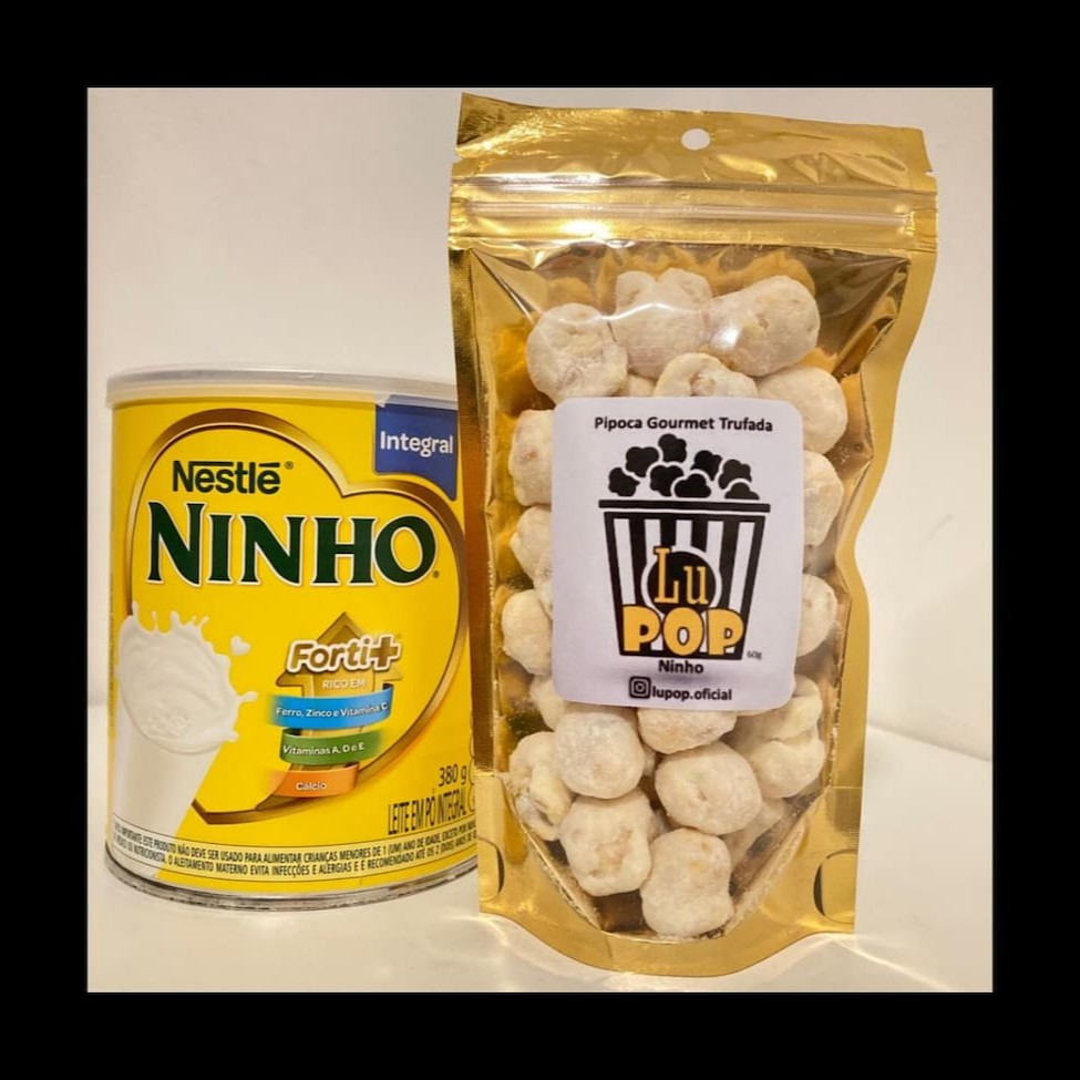 Delicisa pipoca feita com milho importado mushroom, caramelizada, coberta de chocolate branco e leite Ninho de verdade Pacote zip  60g